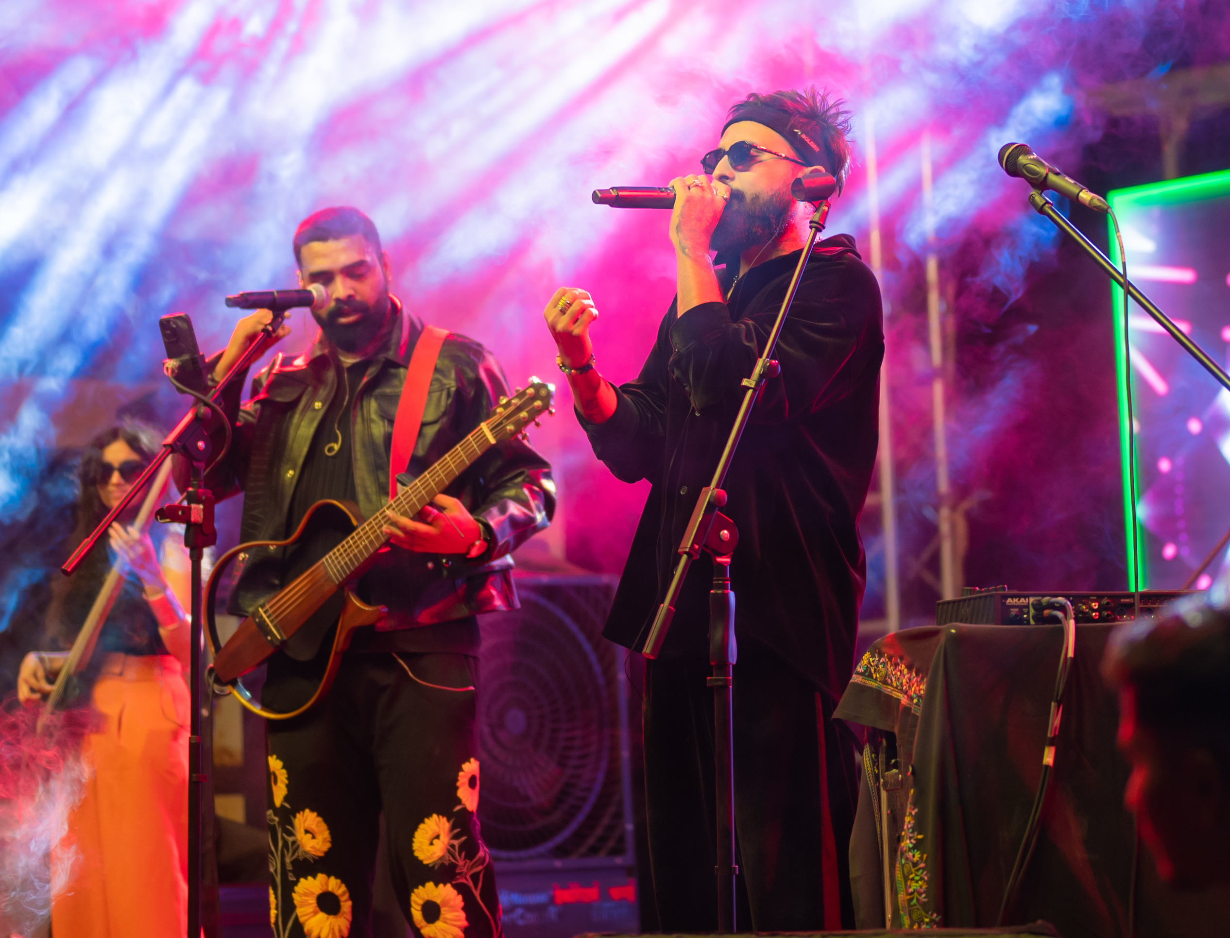 Sabali performing on a festival main stage with smoke and beams